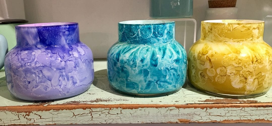 image: colorful candles at Carol Lee's Cottage, Rockport MA