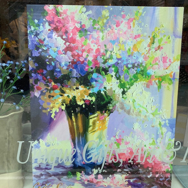 Painting in store window image